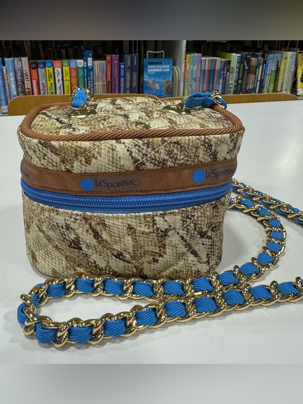 Lesportsac Snake Print Crossbody Bag with Blue and Brown Accents